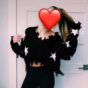 distressed star sweater